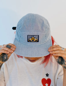 DEEDS NOT WORDS 5-PANEL HAT